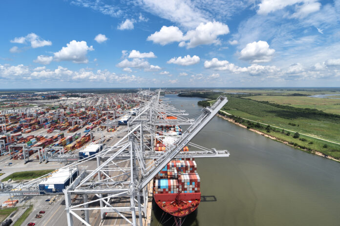 Georgia Ports Authority, a containership berthed in a port with containers and cranes